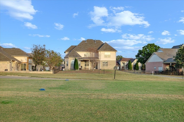 view of front of home with a front yard