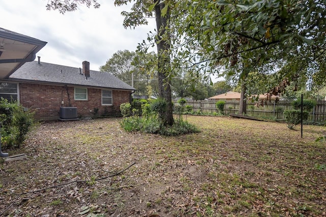 view of yard with central AC