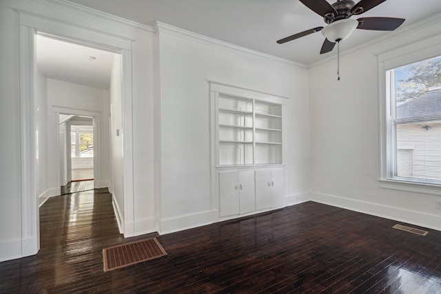 2186 Monroe Ave, Memphis, TN 38104 - spare room featuring dark wood-type flooring, a ceiling fan, baseboards, and crown molding