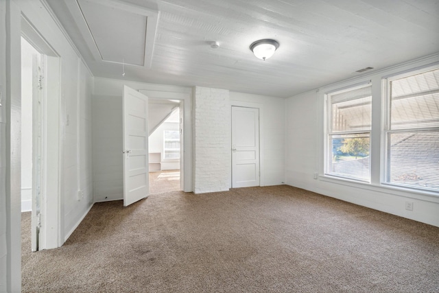 unfurnished bedroom featuring carpet floors and a closet