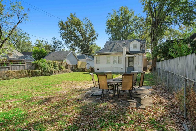 2186 Monroe Ave, Memphis, TN 38104 - view of yard featuring a patio