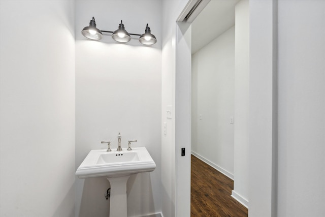 bathroom featuring wood finished floors