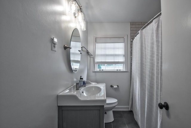 bathroom featuring vanity, curtained shower, toilet, and tile patterned flooring