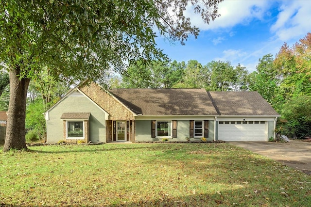 ranch-style home with a front lawn and a garage