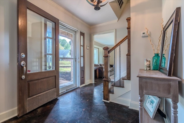 foyer featuring ornamental molding