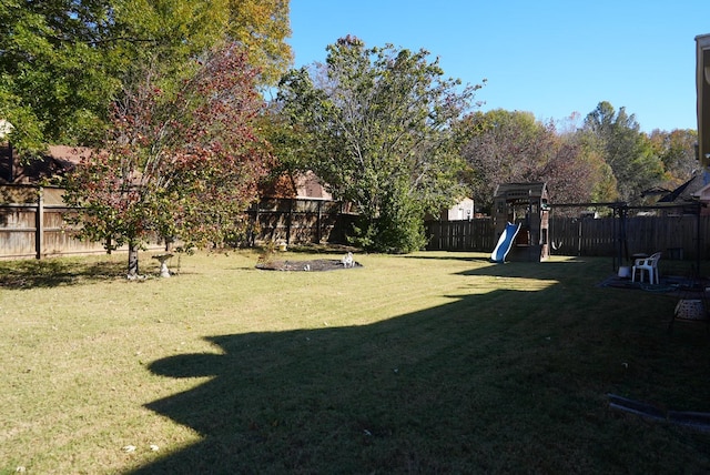 view of yard with a playground