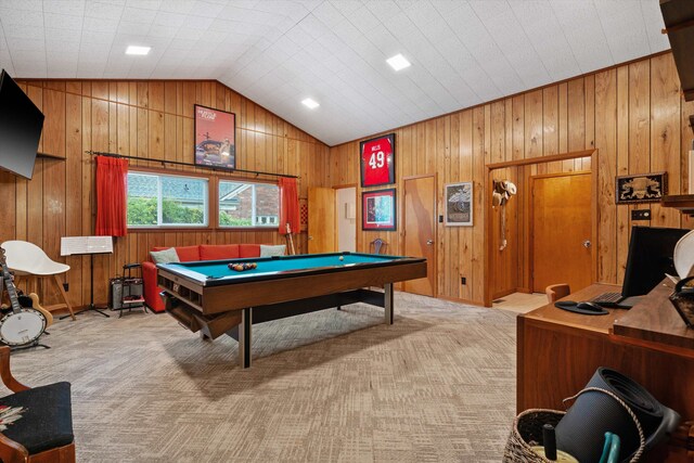 recreation room with billiards, wood walls, light carpet, and vaulted ceiling