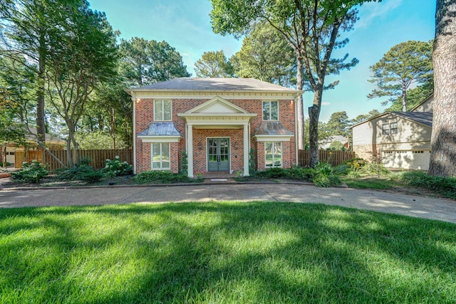 view of front facade with a front yard