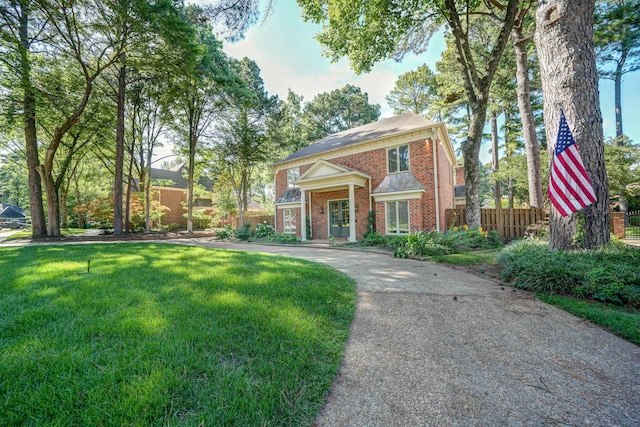 view of front of home with a front yard