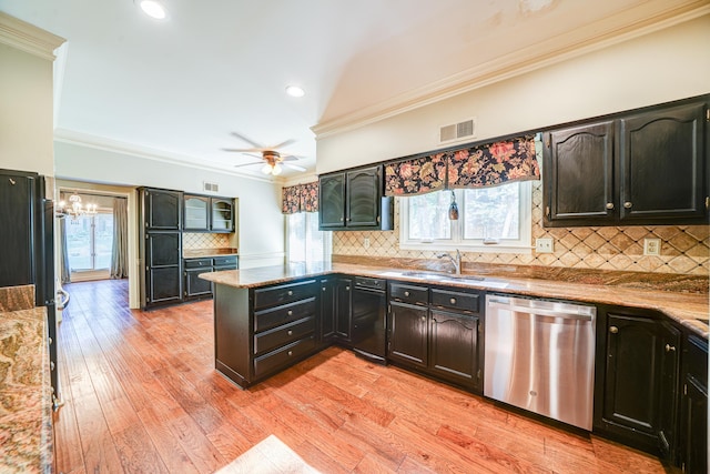 kitchen with light hardwood / wood-style floors, crown molding, dishwasher, and light stone counters