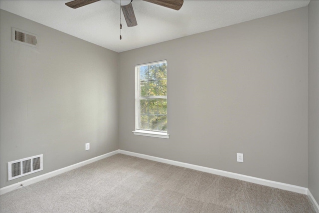 empty room with carpet and ceiling fan