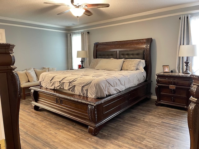 bedroom featuring a textured ceiling, wood-type flooring, ceiling fan, and crown molding