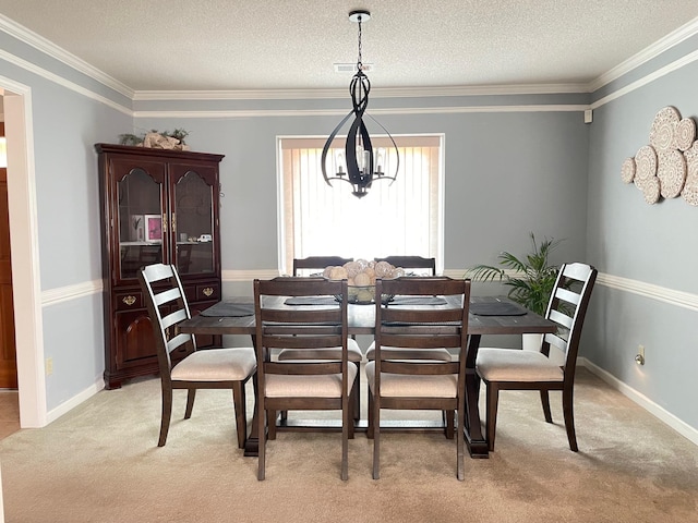 carpeted dining room featuring an inviting chandelier, a textured ceiling, and ornamental molding