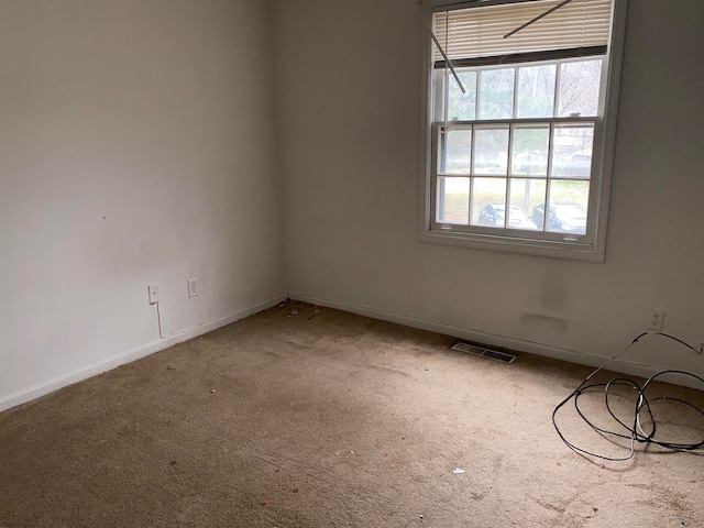 empty room with carpet flooring