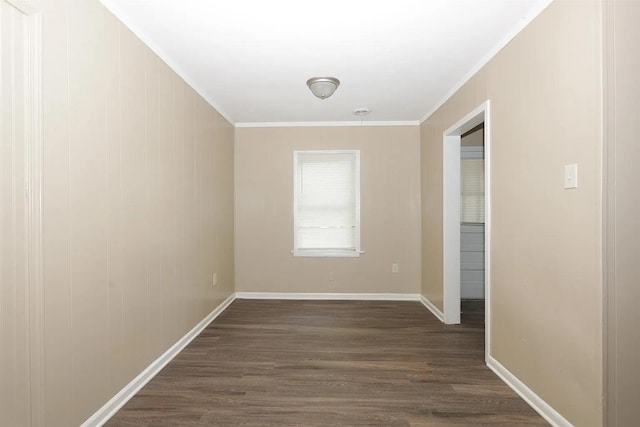 hall with dark hardwood / wood-style flooring and ornamental molding