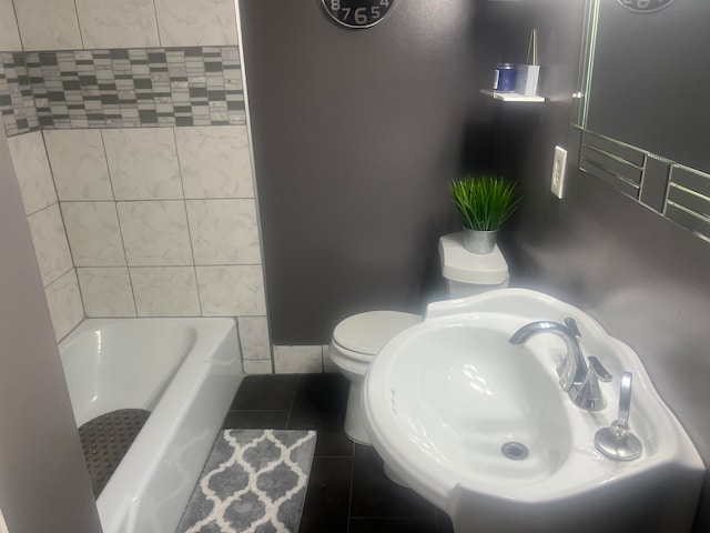 full bathroom featuring tile patterned floors, sink, plus walk in shower, and toilet