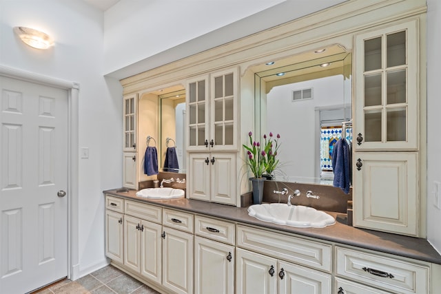 bathroom featuring vanity and tile patterned floors