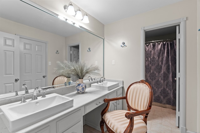 bathroom with vanity and tile patterned floors