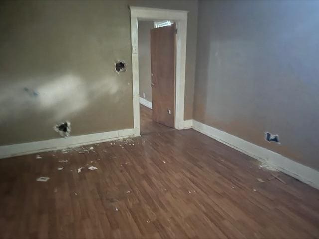 washroom with dark hardwood / wood-style floors