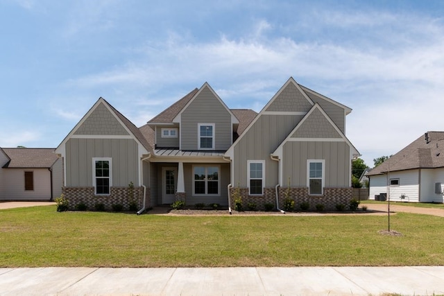 view of front of home with a front yard