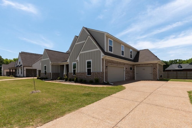 view of front facade featuring a garage and a front lawn