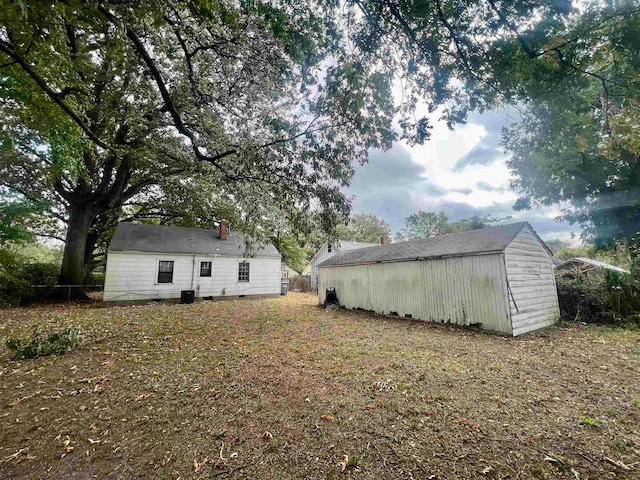 exterior space with an outbuilding