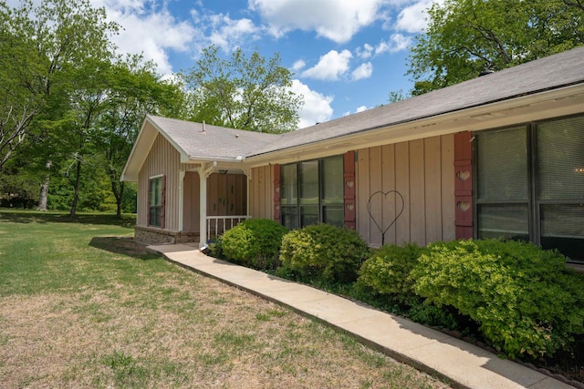 exterior space with a yard