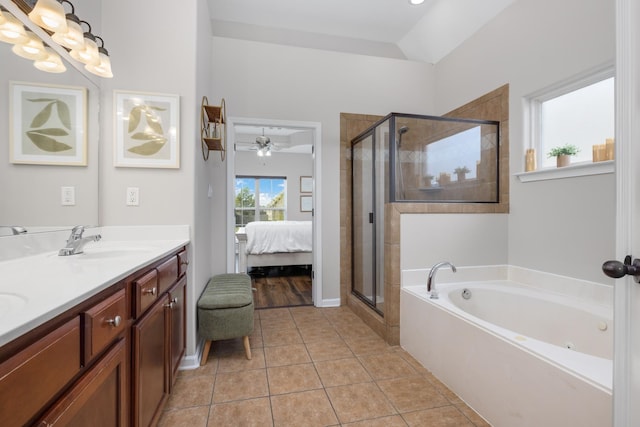 bathroom with shower with separate bathtub, vanity, tile patterned floors, and ceiling fan