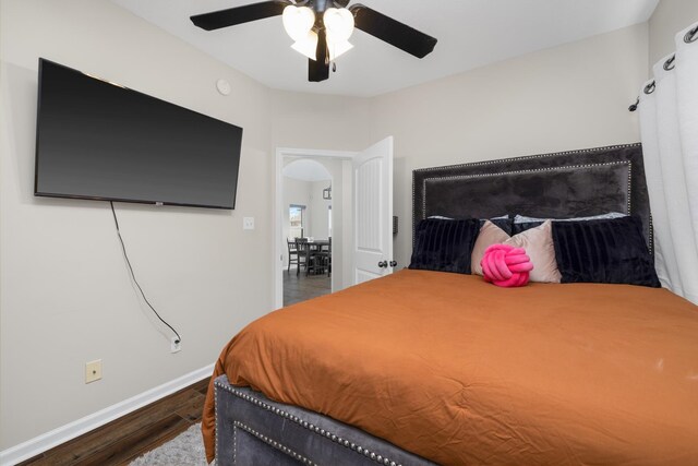 bedroom with wood-type flooring and ceiling fan