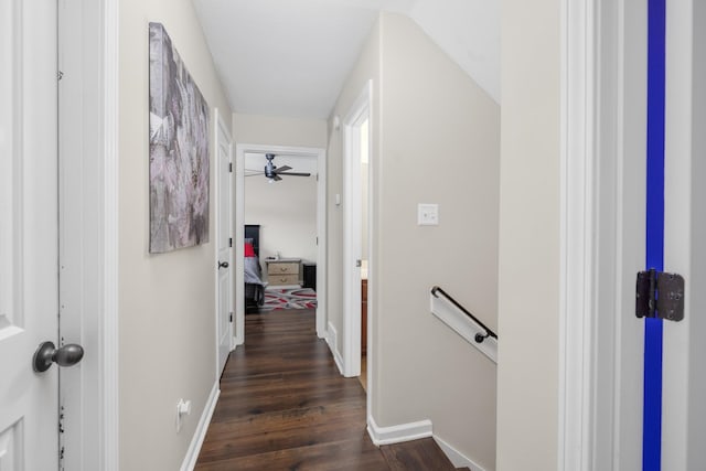 hall with dark wood-type flooring