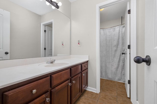 bathroom featuring tile patterned floors and vanity