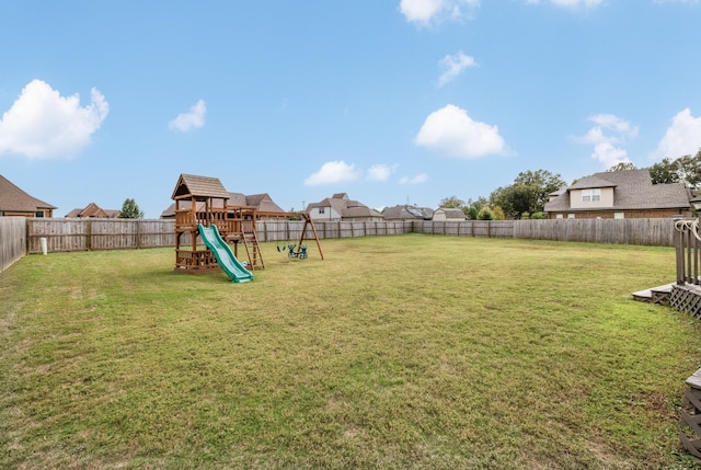 view of yard with a playground