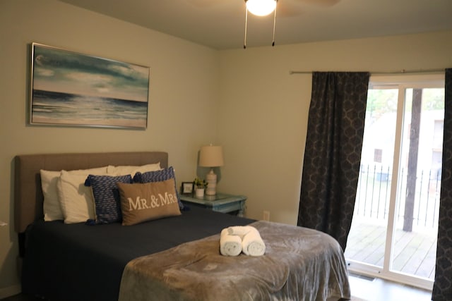 bedroom with access to outside and ceiling fan