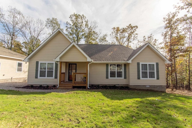 ranch-style house featuring a front lawn and a porch