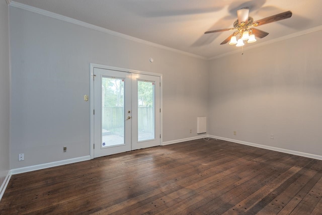 spare room featuring ceiling fan, dark hardwood / wood-style flooring, crown molding, and french doors