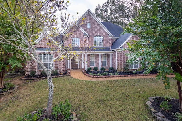 view of front of home with a front yard