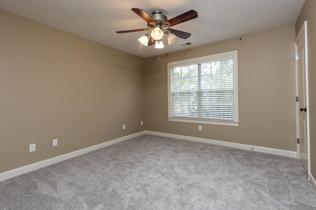 carpeted empty room with ceiling fan