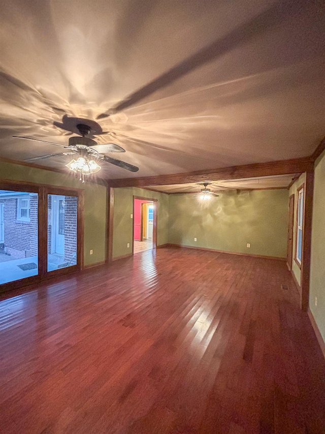 empty room with hardwood / wood-style flooring