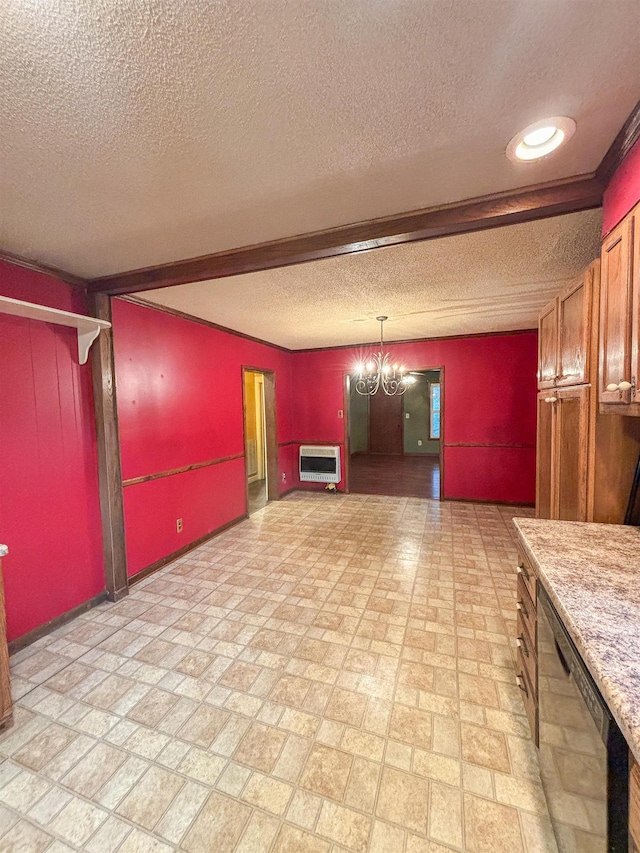 interior space with stainless steel dishwasher, heating unit, a textured ceiling, and decorative light fixtures