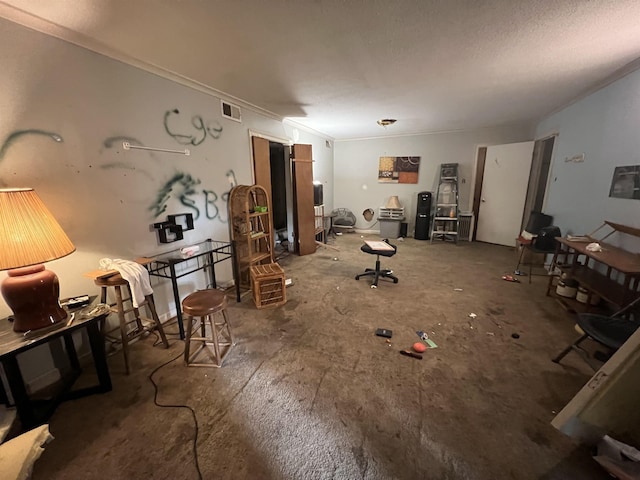 living area with visible vents and ornamental molding