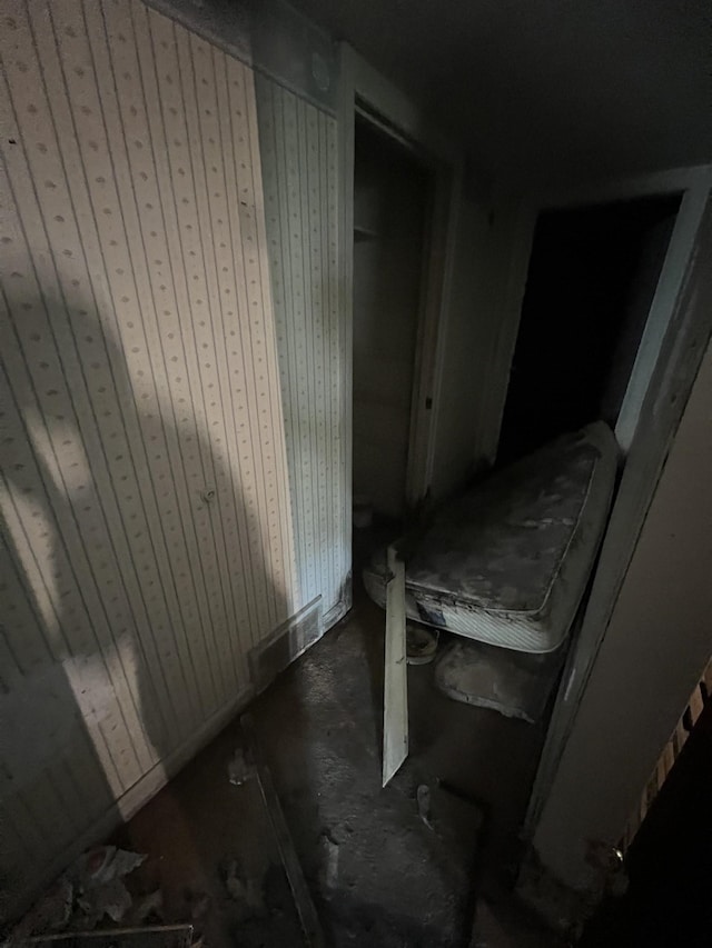 interior space featuring concrete flooring and visible vents