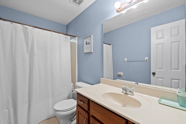 bathroom featuring vanity, tile patterned floors, toilet, and a shower with curtain