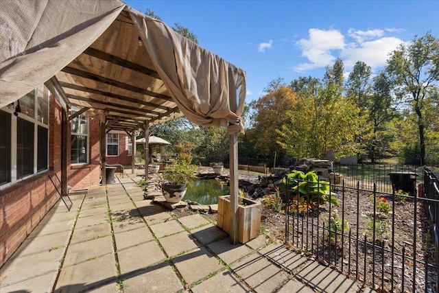 view of patio / terrace featuring a water view