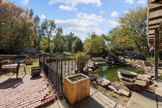 view of patio featuring an outdoor fire pit