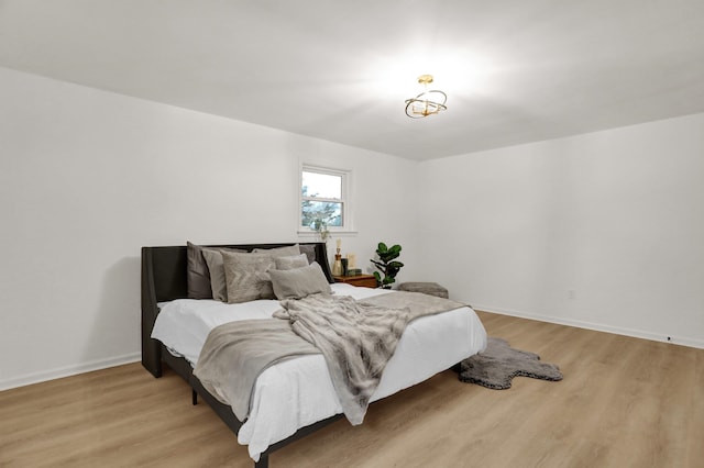 bedroom with light wood-type flooring