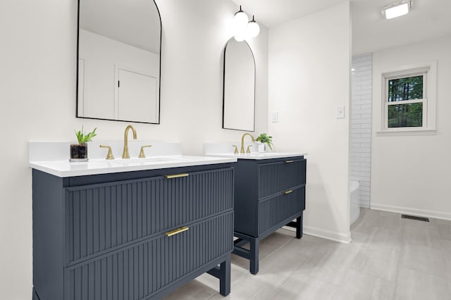 bathroom with tub / shower combination and vanity