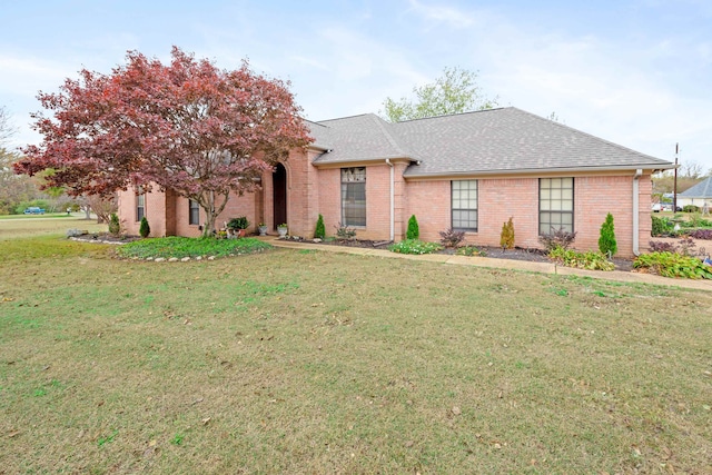 view of front of property with a front yard