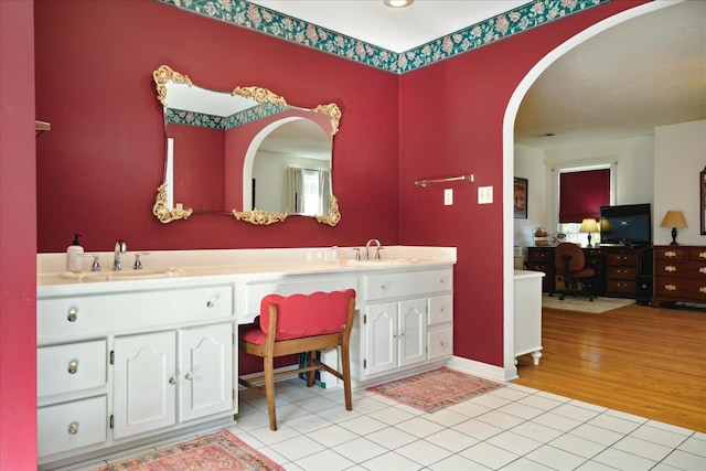 bathroom featuring wood-type flooring and vanity