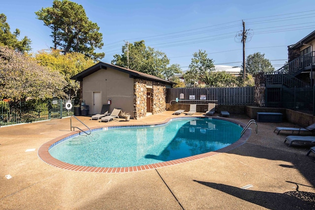 view of pool featuring a patio area