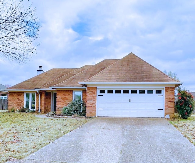 ranch-style house featuring a garage